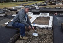 Four unmarked graves rededicated
